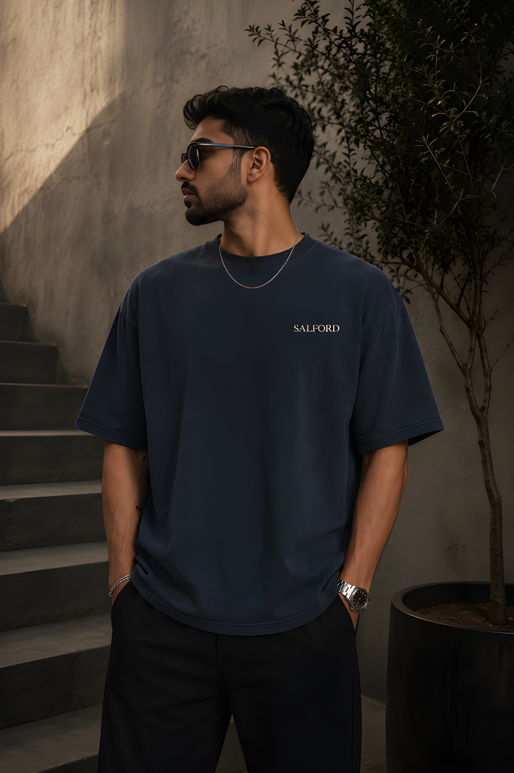 Antim Salford Oversized Navy Blue T-Shirt Front View Male Model Sunglasses Outdoor Streetwear India